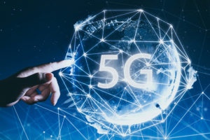 5G Network Wireless Systems And Internet Of Things With Man Touching Abstract Global With Wireless Communication Network On Space Background .