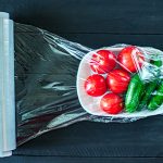 Using Food Film For Vegetables Storage In Fridge. Top View