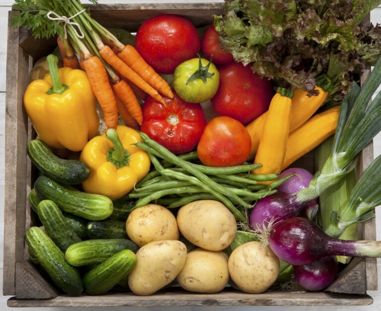 Crate Of Fresh Summer Vegetables From A CSA.